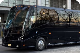 Full-size luxury motorcoach ready for boarding