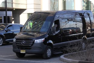 Mini charter bus parked curbside in New Jersey